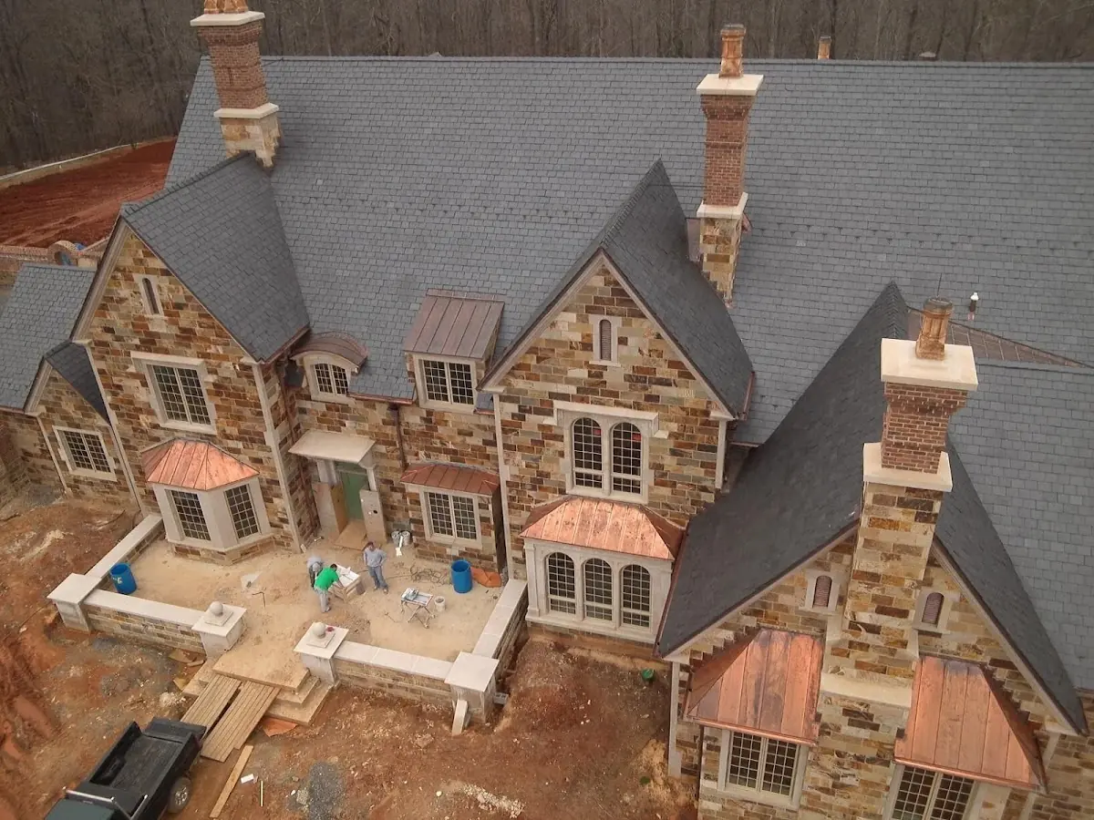 Craftsman Roofing Slate Roof Repair project in Jersey Village